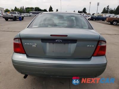 Zdjęcie 6 z 13 samochodu: 2005 FORD FOCUS ZX4 VIN:1FAFP34N55W123056 - miniatura