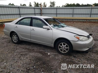 Czwarte zdjęcie samochodu z boku: 2003 TOYOTA CAMRY LE VIN:4T1BE32K33U696114 - miniatura