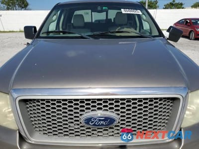 Zdjęcie 11 z 12 samochodu: 2004 FORD F150 VIN:1FTPX12574NA28587 - miniatura