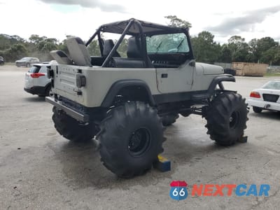 Trzecie zdjęcie samochodu z tyłu: 1993 JEEP WRANGLER / YJ VIN:1J4FY29P9PP260732 - miniatura