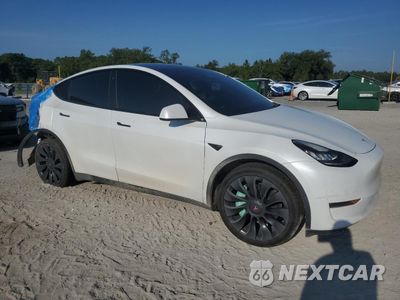 Czwarte zdjęcie samochodu z boku: 2020 TESLA MODEL Y VIN:5YJYGDEE6LF058565 - miniatura