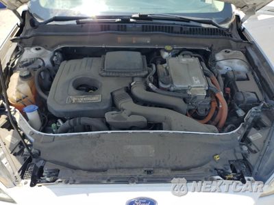 Zdjęcie 11 z 12 samochodu: 2018 FORD FUSION SE HYBRID VIN:3FA6P0LU7JR171940 - miniatura