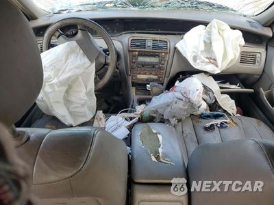 Zdjęcie 8 z 12 samochodu: 2004 TOYOTA AVALON XL VIN:4T1BF28B34U386948 - miniatura