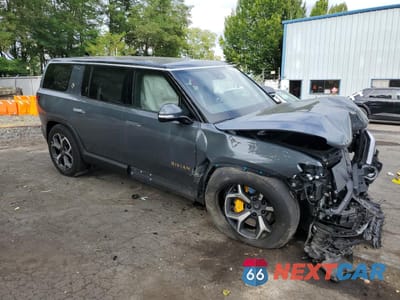 Czwarte zdjęcie samochodu z boku: 2022 RIVIAN R1S LAUNCH EDITION VIN:7PDSGABL2NN002627 - miniatura