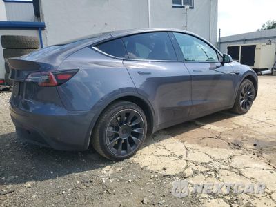 Trzecie zdjęcie samochodu z tyłu: 2022 TESLA MODEL Y VIN:7SAYGDEE3NF440185 - miniatura