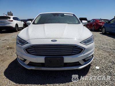 Piąte zdjęcie samochodu w środku: 2017 FORD FUSION SE HYBRID VIN:3FA6P0LUXHR409712 - miniatura