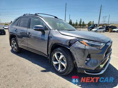 Czwarte zdjęcie samochodu z boku: 2023 TOYOTA RAV4 PRIME SE VIN:JTMAB3FV7PD141170 - miniatura