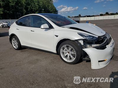 Czwarte zdjęcie samochodu z boku: 2023 TESLA MODEL Y VIN:7SAYGDEE2PA039968 - miniatura