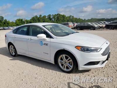 Czwarte zdjęcie samochodu z boku: 2018 FORD FUSION SE HYBRID VIN:3FA6P0LU9JR129964 - miniatura