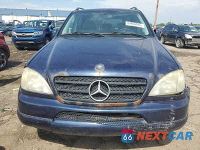 Piąte zdjęcie samochodu w środku: 1999 MERCEDES-BENZ ML 430 VIN:4JGAB72E0XA083851 - miniatura