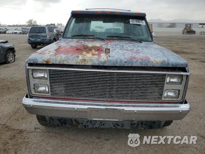 Piąte zdjęcie samochodu w środku: 1987 CHEVROLET SUBURBAN V10 VIN:1GNEV16K5HF122312 - miniatura