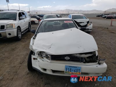 Piąte zdjęcie samochodu w środku: 1991 NISSAN SENTRA VIN:JN1EB31PXMU031500 - miniatura