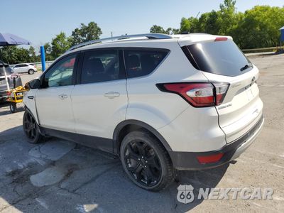 Drugie zdjęcie samochodu z przodu: 2017 FORD ESCAPE TITANIUM VIN:1FMCU9J94HUD78745 - miniatura