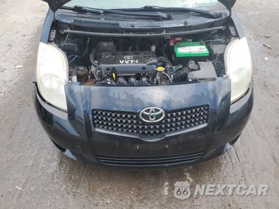 Zdjęcie 11 z 13 samochodu: 2007 TOYOTA YARIS VIN:JTDJT923X75096322 - miniatura