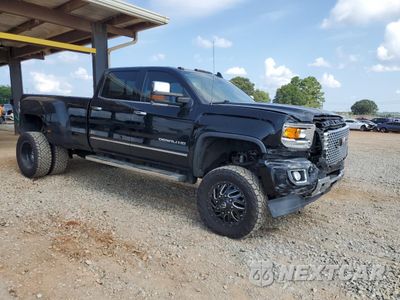 Czwarte zdjęcie samochodu z boku: 2015 GMC SIERRA K3500 DENALI VIN:1GT424E89FF521242 - miniatura