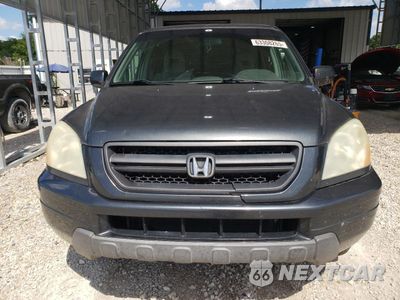 Piąte zdjęcie samochodu w środku: 2004 HONDA PILOT EX VIN:2HKYF18424H509885 - miniatura