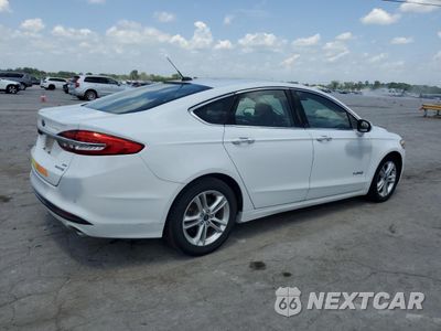 Trzecie zdjęcie samochodu z tyłu: 2018 FORD FUSION SE HYBRID VIN:3FA6P0LU7JR171940 - miniatura