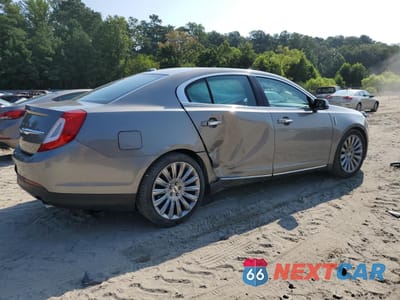 Trzecie zdjęcie samochodu z tyłu: 2015 LINCOLN MKS VIN:1LNHL9DK3FG607550 - miniatura