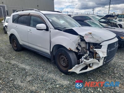 Czwarte zdjęcie samochodu z boku: 2010 MITSUBISHI OUTLANDER XLS VIN:JA4JT3AX1AZ601711 - miniatura