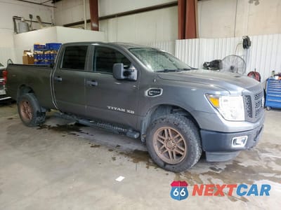 Czwarte zdjęcie samochodu z boku: 2017 NISSAN TITAN XD S VIN:1N6BA1F36HN522222 - miniatura