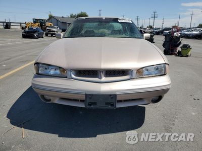 Piąte zdjęcie samochodu w środku: 1999 PONTIAC BONNEVILLE SE VIN:1G2HX52K1XH233699 - miniatura