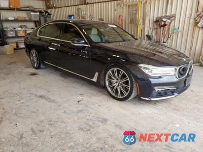 Czwarte zdjęcie samochodu z boku: 2017 BMW 750 I VIN:WBA7F0C55HGM21314 - miniatura