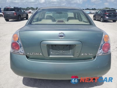 Zdjęcie 6 z 12 samochodu: 2003 NISSAN ALTIMA BASE VIN:1N4AL11D83C186012 - miniatura