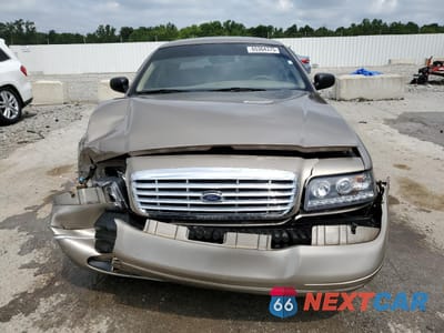 Piąte zdjęcie samochodu w środku: 2004 FORD CROWN VICTORIA LX VIN:2FAFP74W34X118845 - miniatura