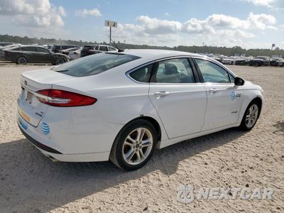 Trzecie zdjęcie samochodu z tyłu: 2018 FORD FUSION SE HYBRID VIN:3FA6P0LU9JR129964 - miniatura