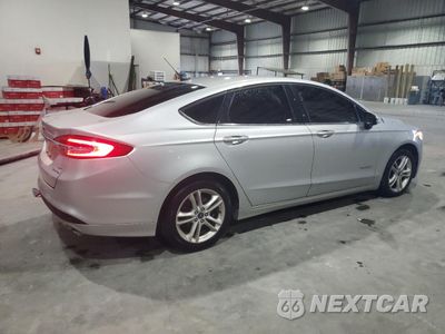 Trzecie zdjęcie samochodu z tyłu: 2018 FORD FUSION SE HYBRID VIN:3FA6P0LU5JR249308 - miniatura