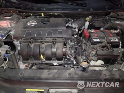 Zdjęcie 11 z 12 samochodu: 2014 NISSAN SENTRA S VIN:3N1AB7AP0EY334290 - miniatura