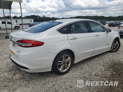Trzecie zdjęcie samochodu z tyłu: 2018 FORD FUSION SE HYBRID VIN:3FA6P0LU6JR171993 - miniatura
