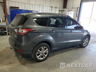 Trzecie zdjęcie samochodu z tyłu: 2018 FORD ESCAPE SE VIN:1FMCU0GD6JUC62427 - miniatura