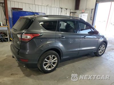 Trzecie zdjęcie samochodu z tyłu: 2018 FORD ESCAPE SE VIN:1FMCU0GD6JUC62427 - miniatura