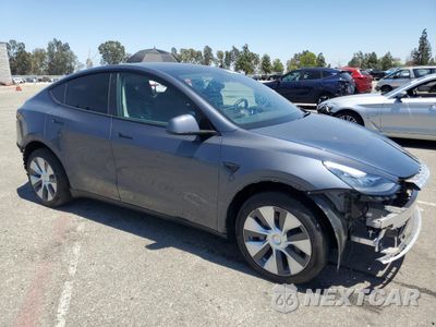 Czwarte zdjęcie samochodu z boku: 2023 TESLA MODEL Y VIN:7SAYGDEE9PA089833 - miniatura