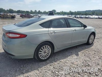 Trzecie zdjęcie samochodu z tyłu: 2014 FORD FUSION SE HYBRID VIN:3FA6P0LU1ER246556 - miniatura