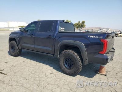 Trzecie zdjęcie samochodu z tyłu: 2022 TOYOTA TUNDRA CREWMAX SR VIN:5TFLA5DB5NX021217 - miniatura