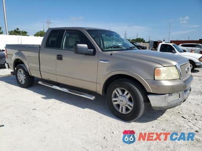 Czwarte zdjęcie samochodu z boku: 2004 FORD F150 VIN:1FTPX12574NA28587 - miniatura
