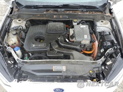 Zdjęcie 11 z 13 samochodu: 2017 FORD FUSION SE HYBRID VIN:3FA6P0LU6HR359553 - miniatura