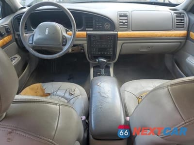Zdjęcie 8 z 12 samochodu: 1999 LINCOLN CONTINENTAL VIN:1LNHM97V4XY610195 - miniatura
