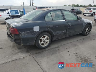 Trzecie zdjęcie samochodu z tyłu: 2003 MITSUBISHI GALANT ES VIN:4A3AA46G03E213886 - miniatura