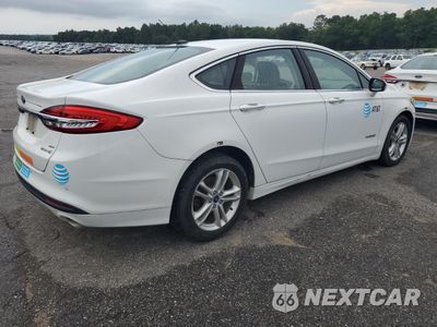 Trzecie zdjęcie samochodu z tyłu: 2018 FORD FUSION SE HYBRID VIN:3FA6P0LU4JR278671 - miniatura