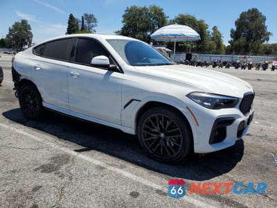 Czwarte zdjęcie samochodu z boku: 2022 BMW X6 XDRIVE40I VIN:5UXCY6C08N9K65769 - miniatura