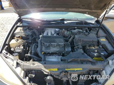 Zdjęcie 11 z 12 samochodu: 2002 TOYOTA CAMRY LE VIN:4T1BF30K72U513151 - miniatura