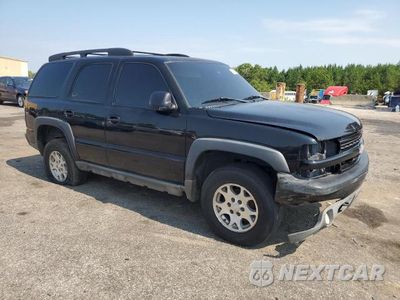 Czwarte zdjęcie samochodu z boku: 2003 CHEVROLET TAHOE K1500 VIN:1GNEK13Z23R223504 - miniatura