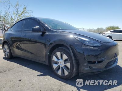 Czwarte zdjęcie samochodu z boku: 2023 TESLA MODEL Y VIN:7SAYGAEE0PF626302 - miniatura