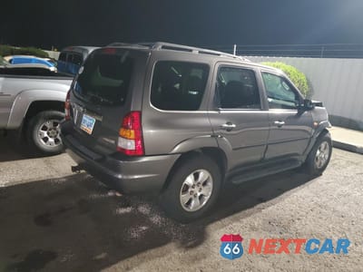 Trzecie zdjęcie samochodu z tyłu: 2003 MAZDA TRIBUTE ES VIN:4F2CZ06113KM34892 - miniatura