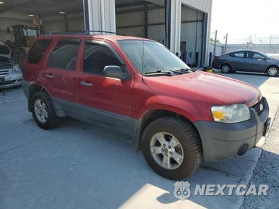 Czwarte zdjęcie samochodu z boku: 2007 FORD ESCAPE XLT VIN:1FMYU931X7KA16328 - miniatura