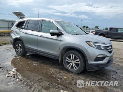 Czwarte zdjęcie samochodu z boku: 2018 HONDA PILOT EX VIN:5FNYF6H3XJB009746 - miniatura