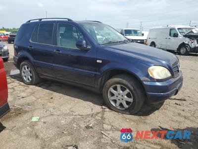 Czwarte zdjęcie samochodu z boku: 1999 MERCEDES-BENZ ML 430 VIN:4JGAB72E0XA083851 - miniatura